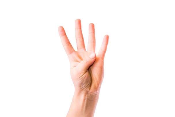 Child's hand showing number four - Foto, Imagem