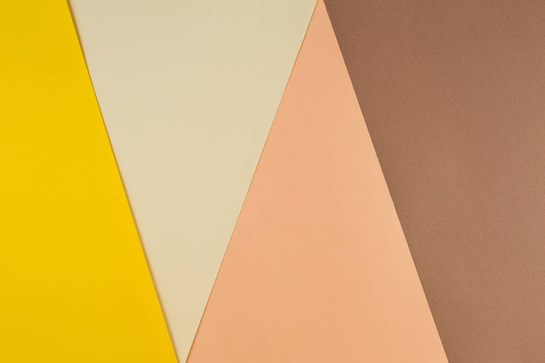 Colorful brown, beige and yellow paper background. - Fotó, kép