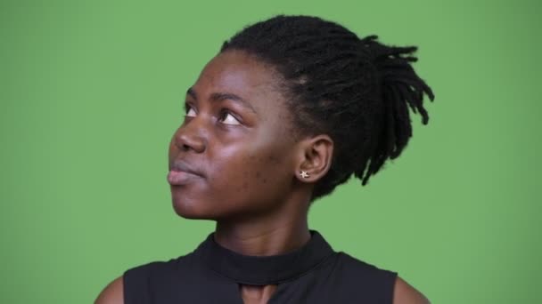 Young beautiful African businesswoman thinking - Felvétel, videó