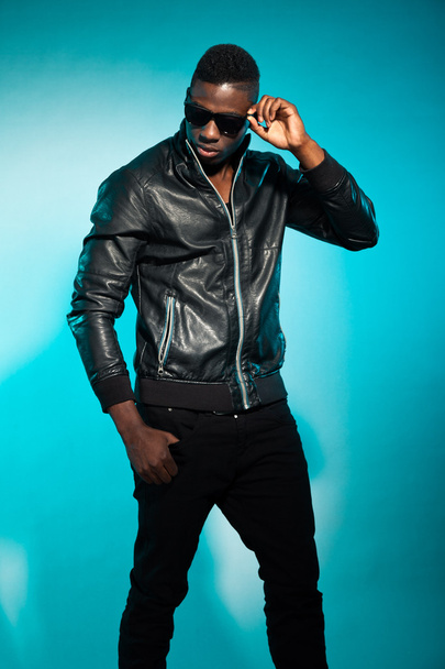 Cool urban stylish black american man. Fashion studio shot. - Photo, image