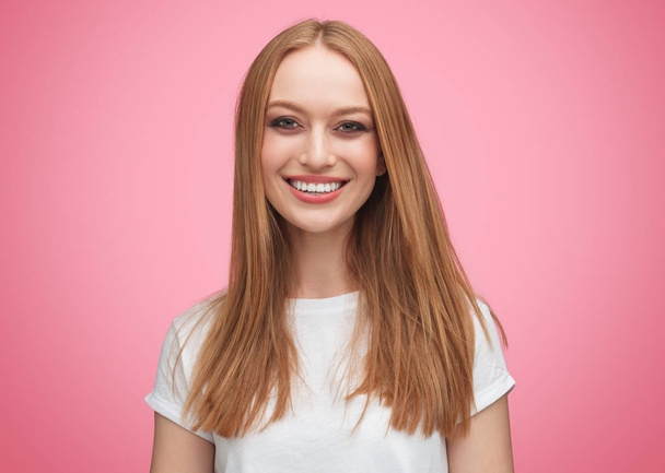 Gorgeous young smiling female in white shirt  - Zdjęcie, obraz