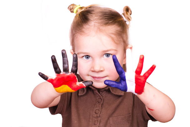 Beautiful girl with hands painted as German and French flags - Zdjęcie, obraz