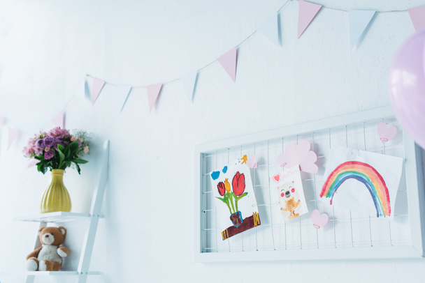 decorated for birthday room with balloons and child paintings  - Fotoğraf, Görsel
