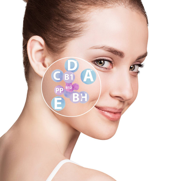 Woman face with vitamins icons. Healthy skin concept. - Photo, Image