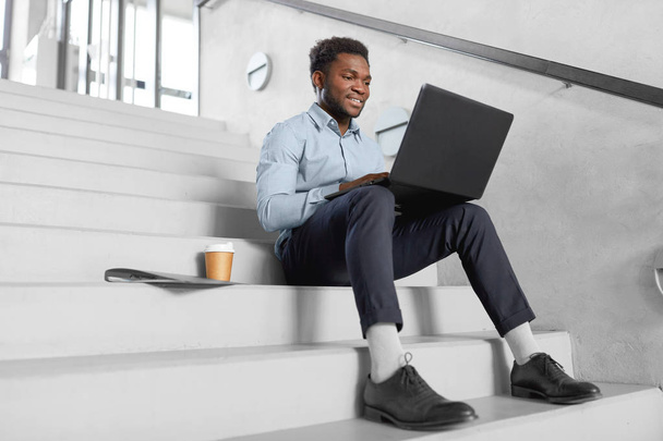 african american businessman with laptop at office - Photo, Image