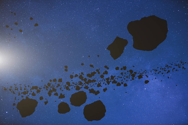 Meteoros y asteroides sobre un fondo estrellado
 - Foto, Imagen