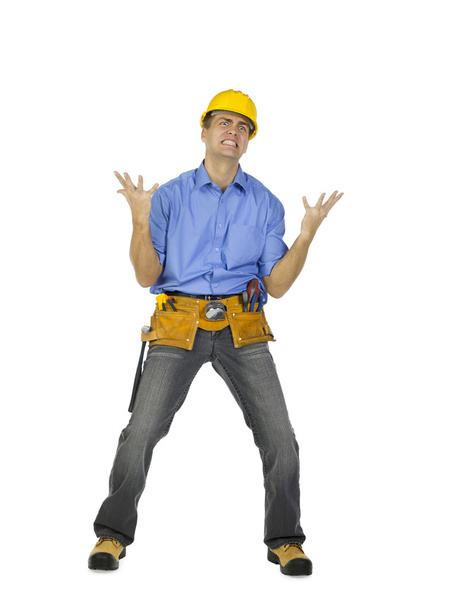 an angry male construction worker - Фото, изображение