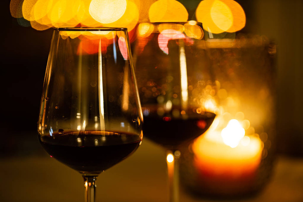 red wine and candles, close up - Photo, image