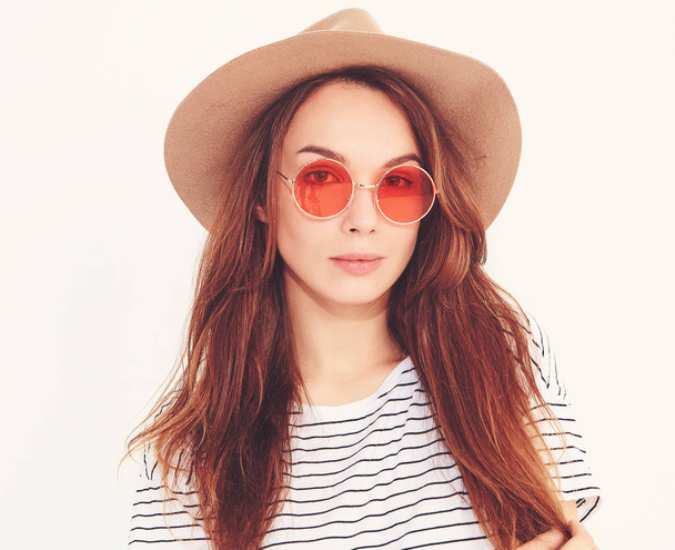 Portrait of young stylish laughing girl model in casual summer clothes in brown hat with natural makeup isolated on white background. In sunglasse - Φωτογραφία, εικόνα