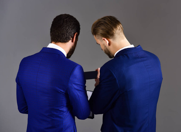 Men in suit or businessmen hold paper document - Фото, изображение