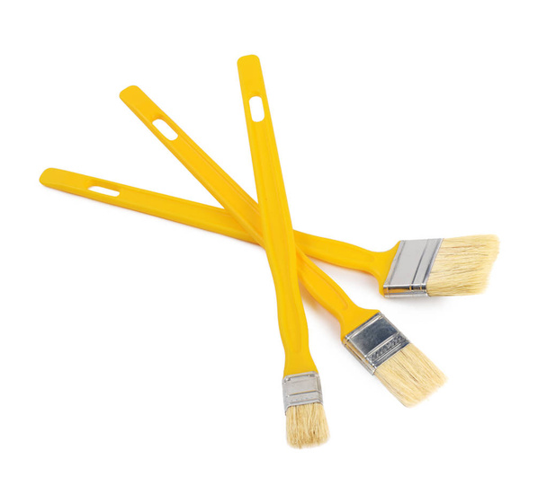 The yellow a brush for painting paint - Foto, Bild