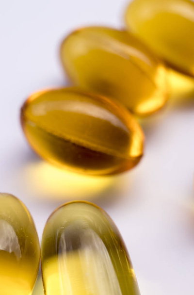 Cod fish liver oil capsules vitamin and mineral health and healthy joint natural supplement. - Fotografie, Obrázek