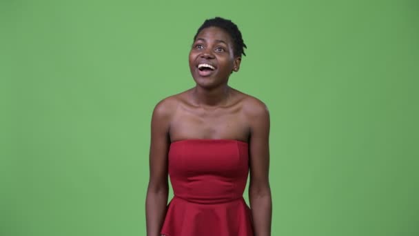 Young beautiful African woman clapping hands - Felvétel, videó