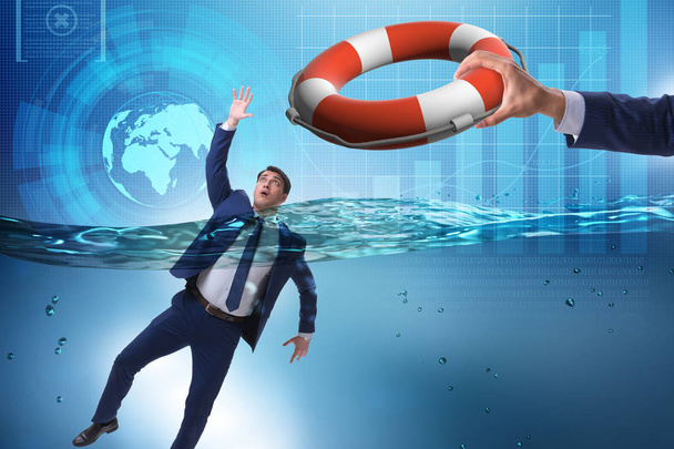 Businessman being saved from drowning - Photo, Image