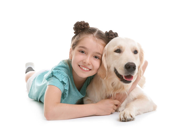 Cute little child with her pet on white background - Foto, Imagen