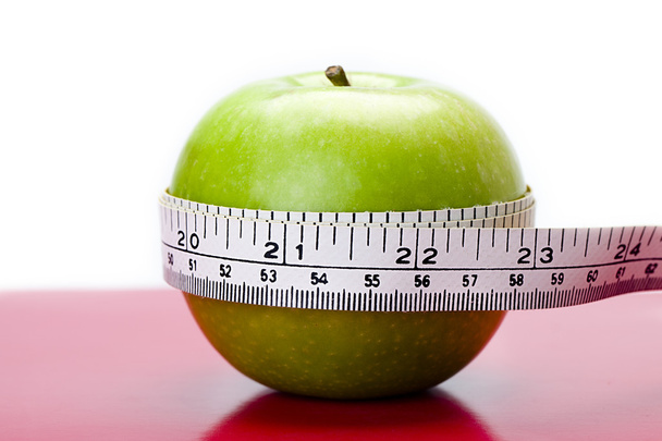 Apfel wird gemessen - Foto, Bild