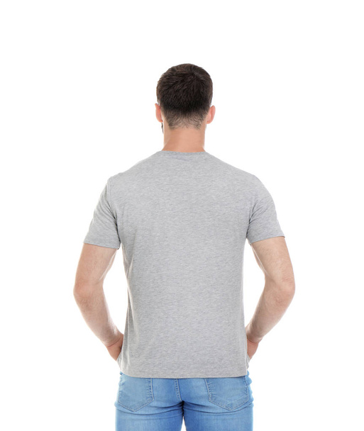 Young man in t-shirt on white background. Mockup for design - Фото, изображение