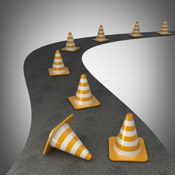 Orange highway traffic cone with white stripes on road - Foto, afbeelding