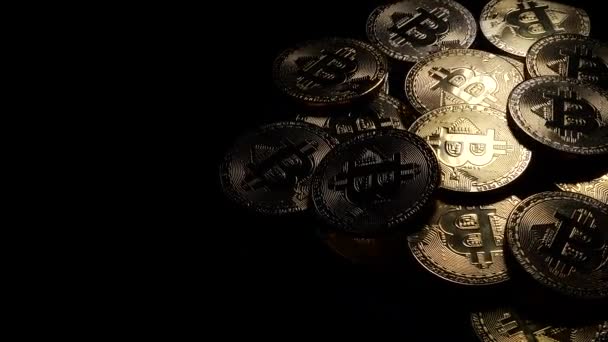 Macro closeup of crypto currency Bitcoin spinning coins  - Footage, Video