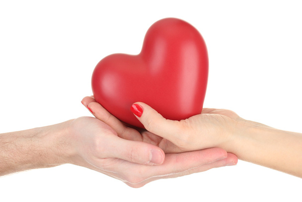 Red heart in woman and man hands, isolated on white - Φωτογραφία, εικόνα
