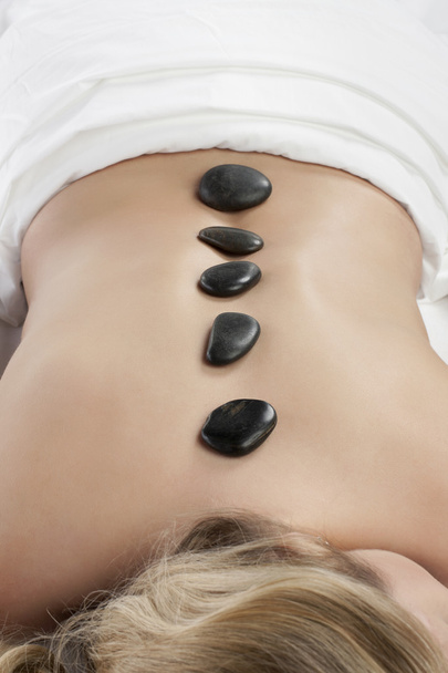 aromatherapy hot stone massage - Фото, изображение