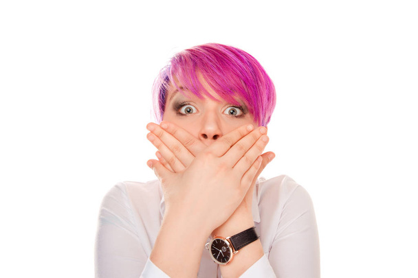 Expressive woman with pink hairstyle covering mouth with hands and looking frightened at camera isolated on white background - Φωτογραφία, εικόνα