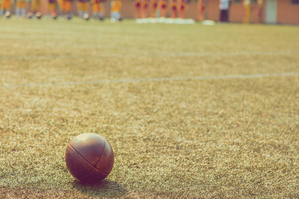 American football ball on the field  - Foto, Imagen
