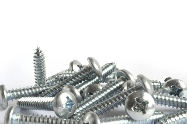 Set of screws on the white background. - Photo, Image