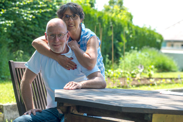 an happy senior couple in the garden - Foto, Imagem