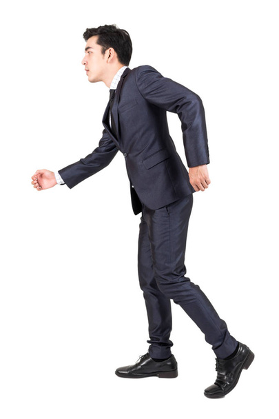 Businessman walking forward isolated on white background - Foto, Bild