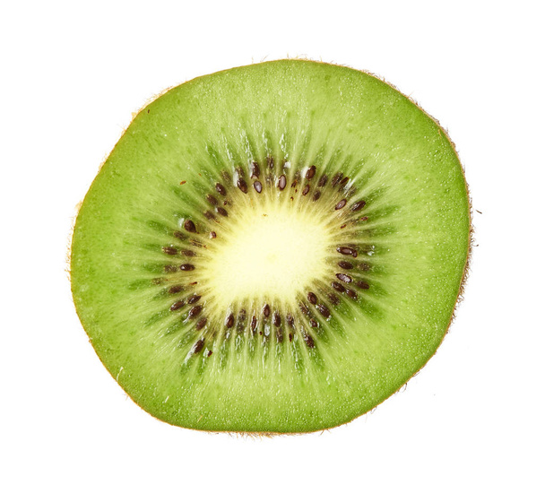 Slice of kiwi fruit isolated on white background - Foto, afbeelding