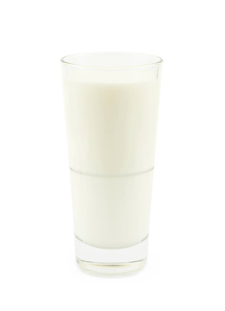Tall glass of milk isolated over the white background - 写真・画像