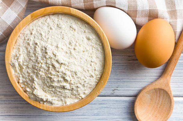 flour and eggs on kitchen table - Fotografie, Obrázek