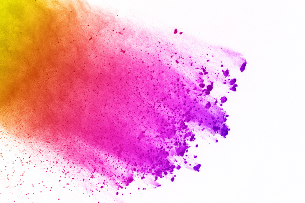 Colorful of powder explosion on white background. Colored dust explode on isolate background. Paint Holi. Colorful cloud splash. - Photo, Image