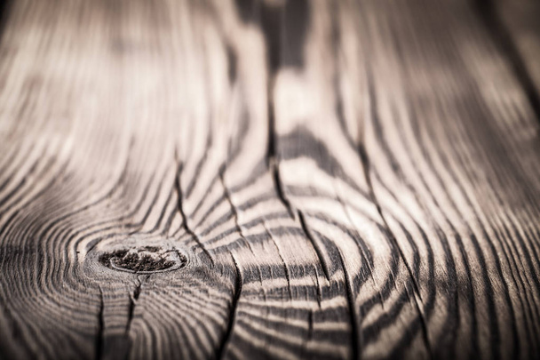 An old board with knots and chips. Wood. Background. Selective focus - Фото, зображення