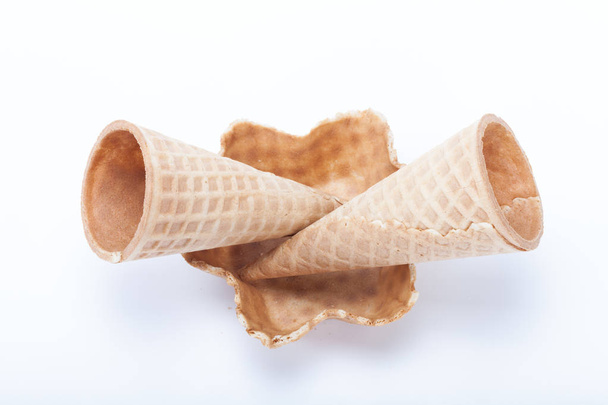 Empty sugar waffle cones for the ice cream isolated on white background. - Photo, Image