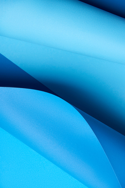 close-up view of creative bright blue abstract paper background    - Photo, Image