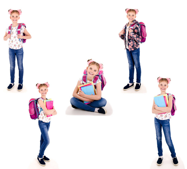 Kokoelma kuvia muotokuva hymyilevä onnellinen koulutyttö lapsi koululaukku reppu ja kirjoja eristetty valkoinen tausta koulutus käsite
 - Valokuva, kuva
