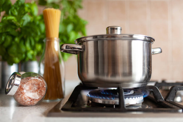 Cooking spaghetti in a pot - Фото, изображение
