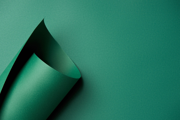 美しい明るい抽象緑紙背景のクローズ アップ ビュー      - 写真・画像