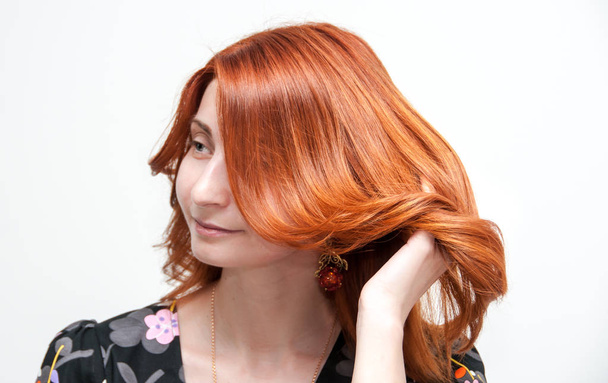 Girl with red hair on white background - Zdjęcie, obraz