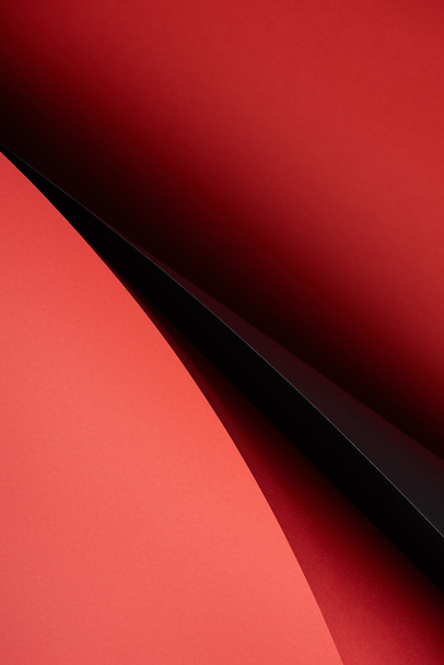 close-up view of creative abstract red and black paper background - Фото, зображення