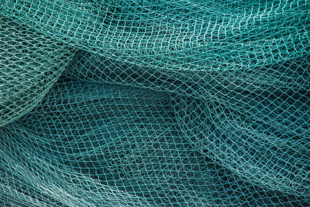 Gros plan de vieux filets de pêche verts. texture abstraite
 - Photo, image