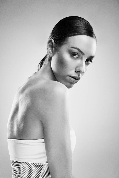 Black and white portrait of attractive young woman - Fotó, kép