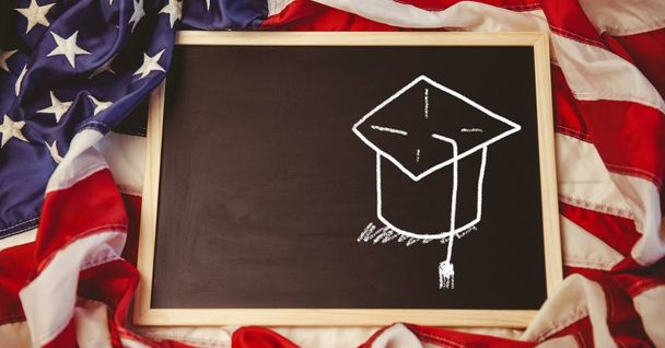 Digital composite of Graduation hat Education drawing on blackboard for school - Photo, image