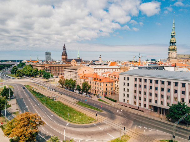 July 2, 2018. Riga, Latvia. Aerial view of Riga city - capital of Latvia. Amazing view on the river Daugava, old town, national library, bridges over the river and the main TV tower. - 写真・画像