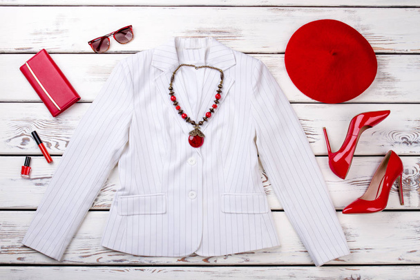 Flat lay white suit jacket with accessories. - Photo, Image
