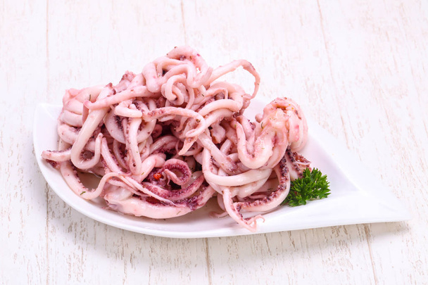 Calamar marinado tentackle en el bowl
 - Foto, imagen