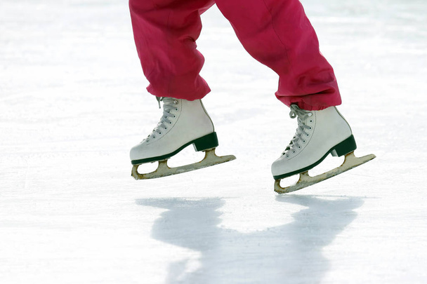 girl skates on ice rin - Photo, Image