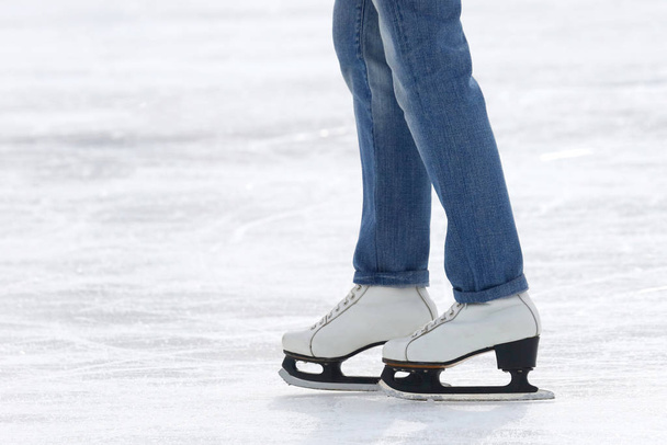 feet skating on the ice rin - Фото, изображение